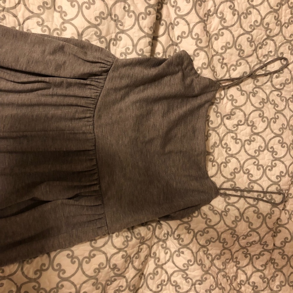 Grey jumper.